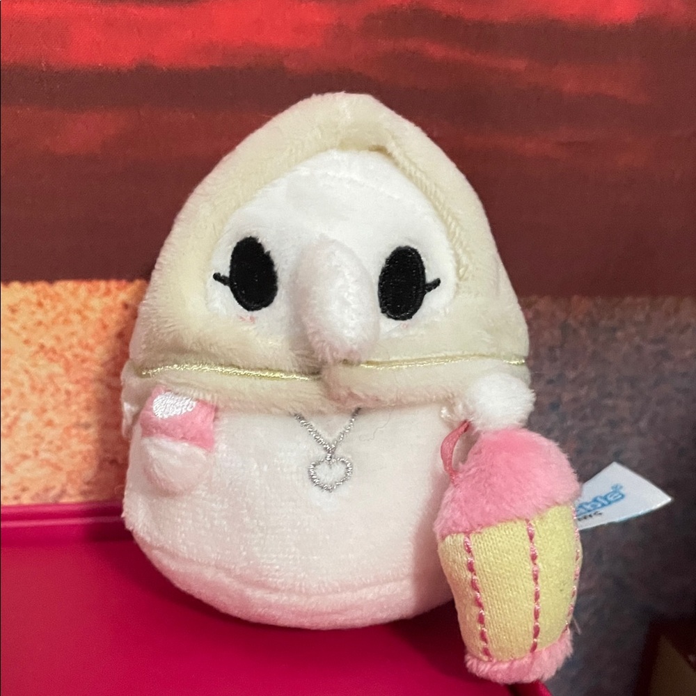 Micro Squishable Plaque Nurse key chain.